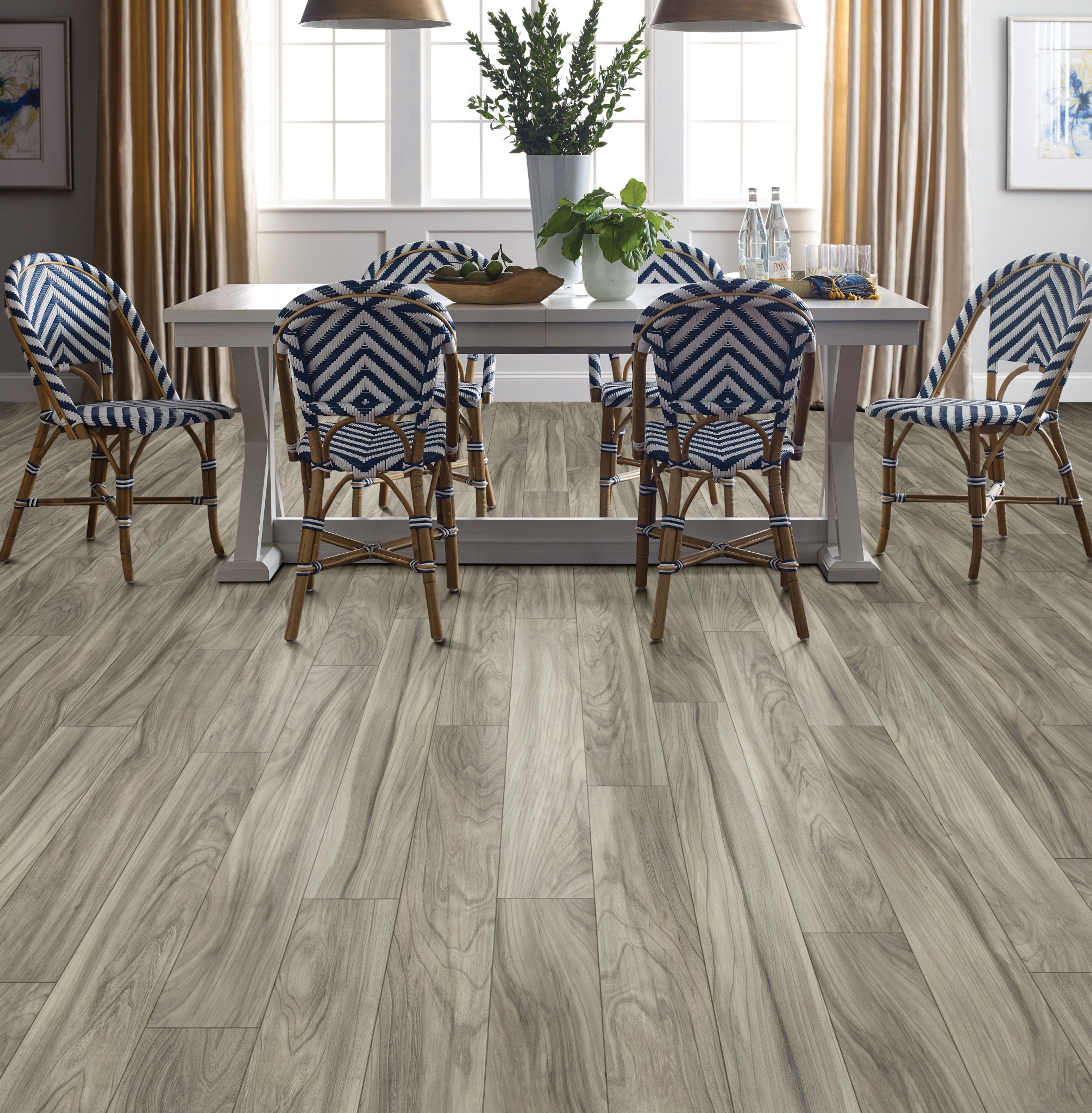 Dining room with wood-look laminate flooring from Carneys Carpet Gallery in Jeffersontown, KY